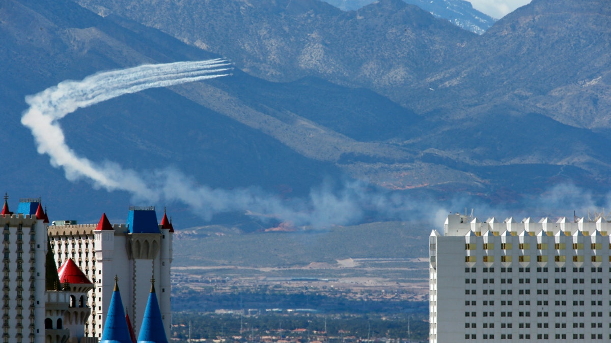 The U.S. Air Force Air flight demonstration squadron, the Thunderbirds, show their support for frontline COVID-19 healthcare workers and first responders with a flyover in Las Vegas, Saturday, April 11, 2020.