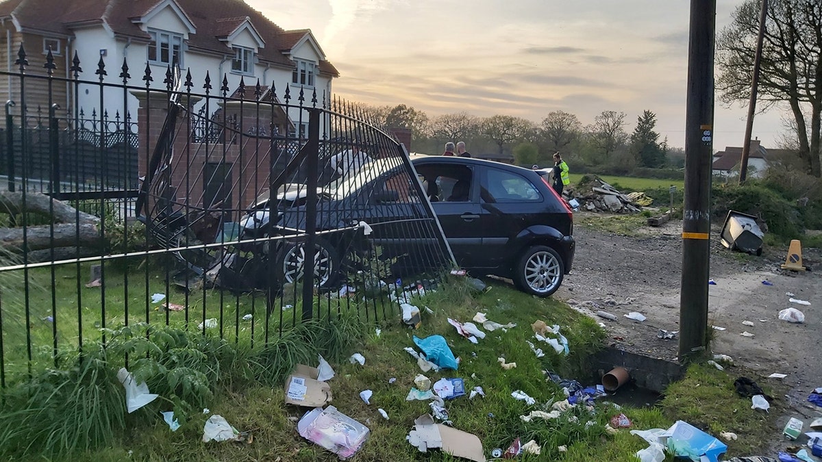 A driver in England who crashed into a fence Tuesday has been criticized by police who said the motorist went for a drive after being "bored" during the coronavirus lockdown.