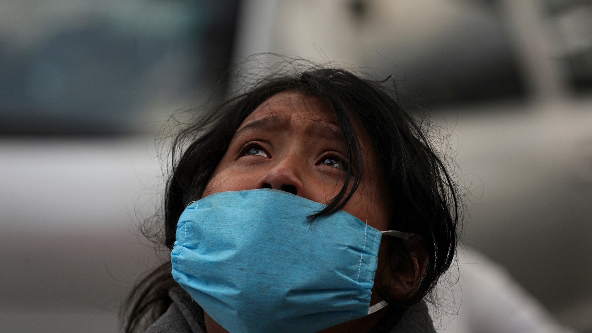 Aurora Guadalupe Azamar reacts after learning that her mother died of COVID-19 disease, outside of a public hospital at Iztapalapa, Mexico City, April 29, 2020. 