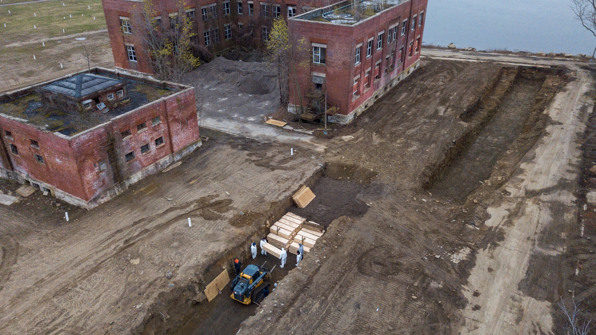Bodies are buried on Hart Island amid the coronavirus disease outbreak in New York City, April 9, 2020.