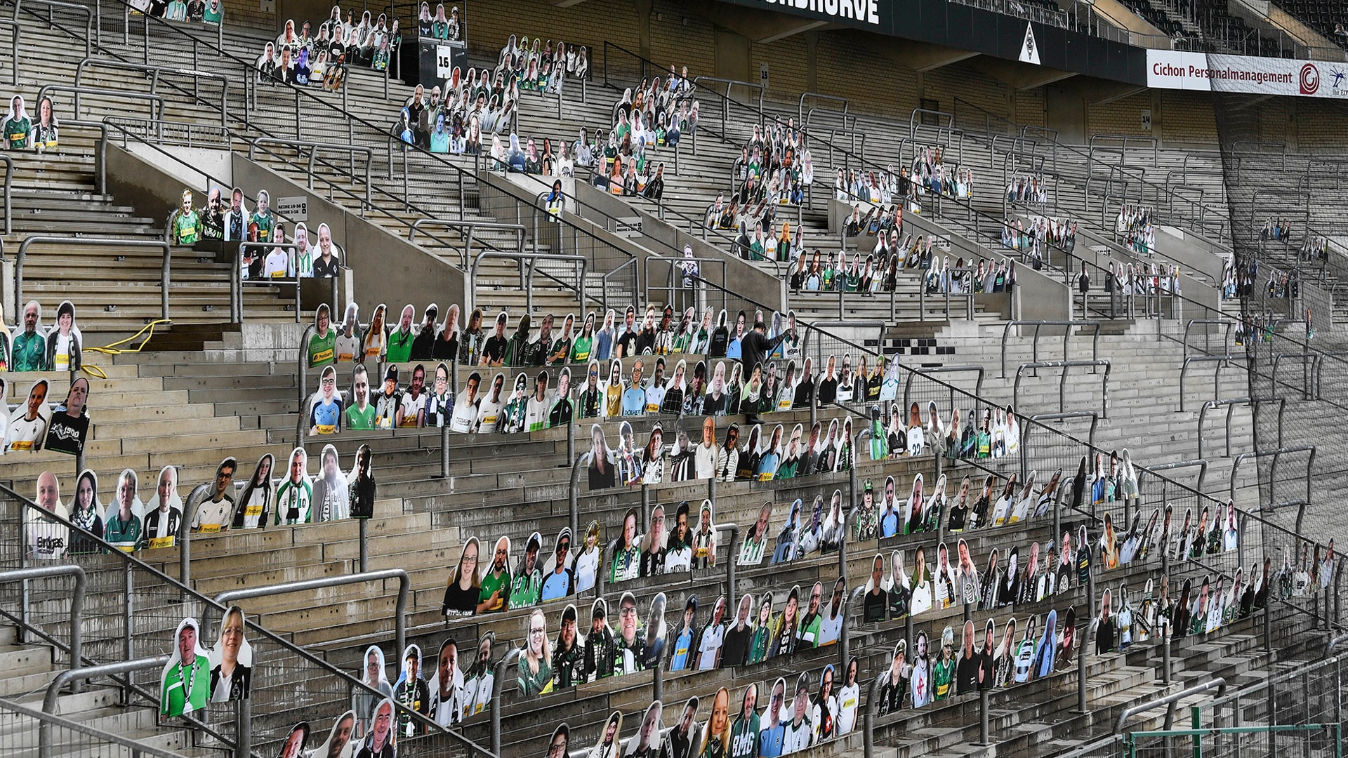 Portraits of fans of German Bundesliga soccer club Borussia Moenchengladbach are set on the supporter's tribune in the stadium in Moenchengladbach, Germany, April 16, 2020. 