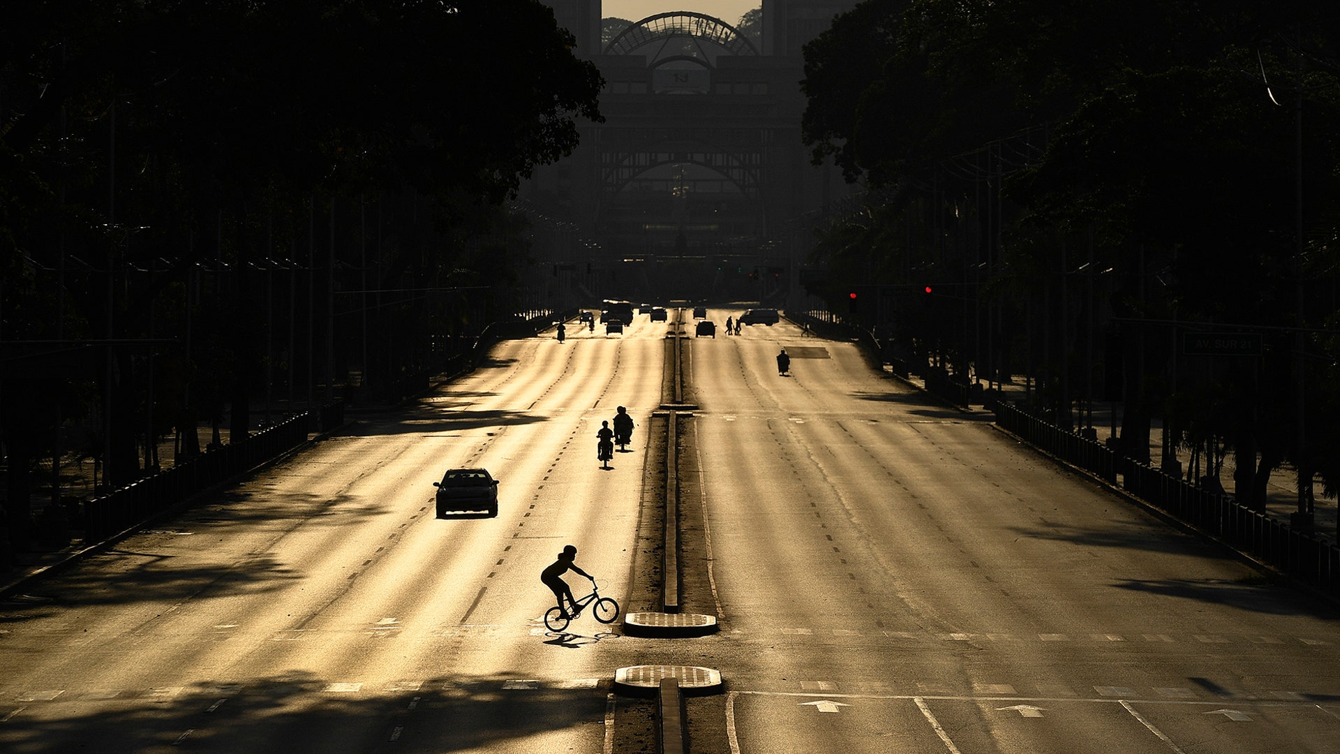 Venezuelan BMX racer Stefany Hernandez rides her bicycle on Bolivar Avenue in Caracas, Venezuela, April 25, 2020. 