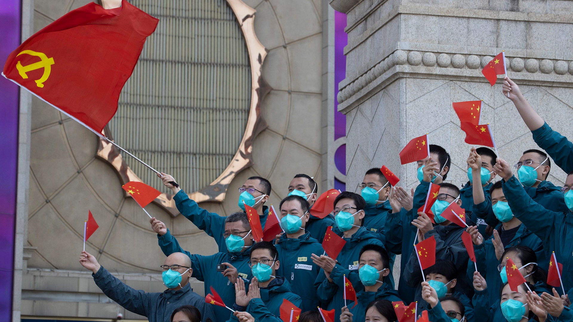 A farewell ceremony is held for the last group of medical workers who came from outside Wuhan to help the city during the coronavirus outbreak in Wuhan, China, April 15, 2020. 