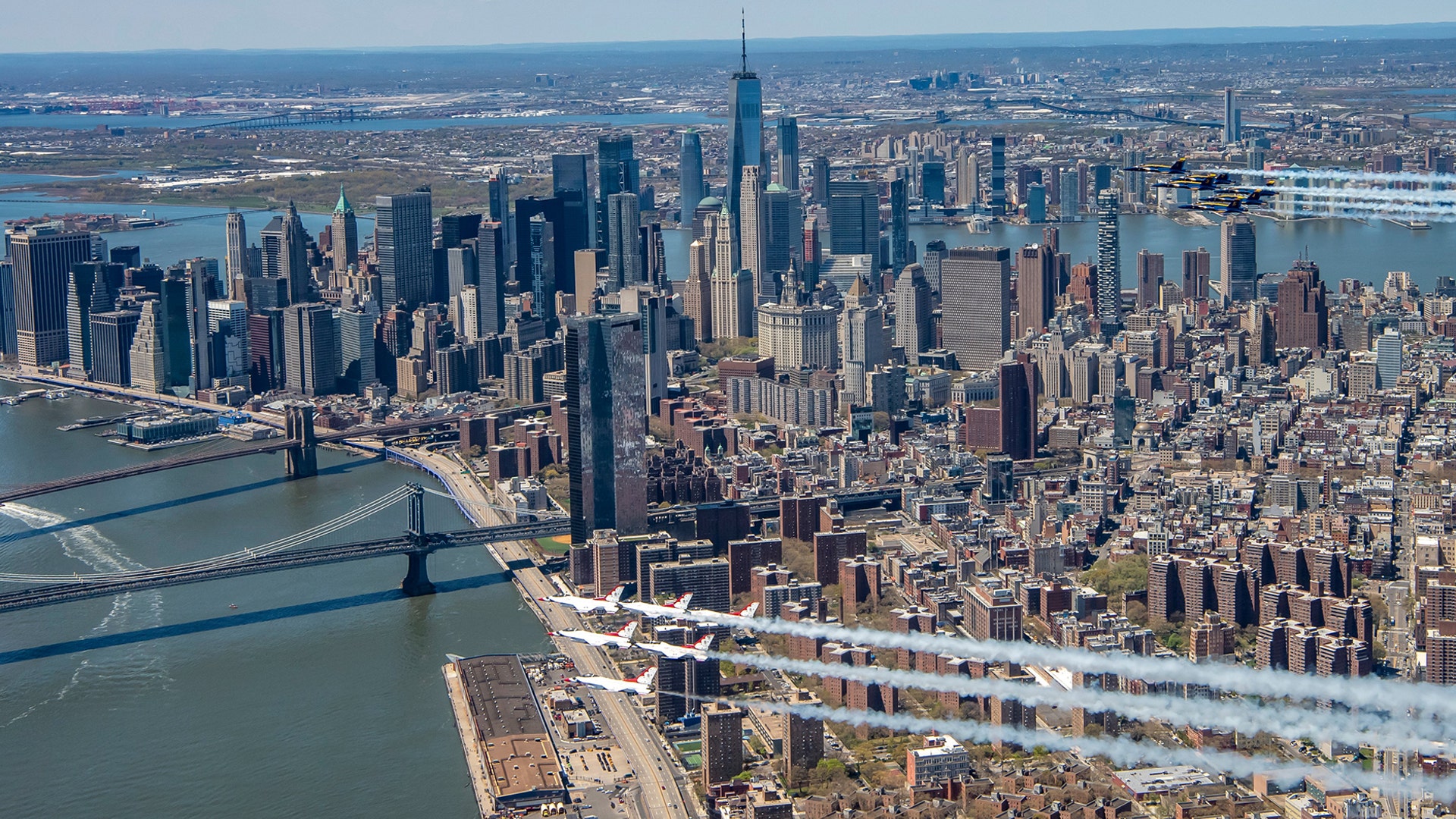 The U.S. Air Force's Thunderbirds and the U.S. Navy's Blue Angels fly over Manhattan to honor COVID-19 frontline workers in New York City, April 28, 2020. 