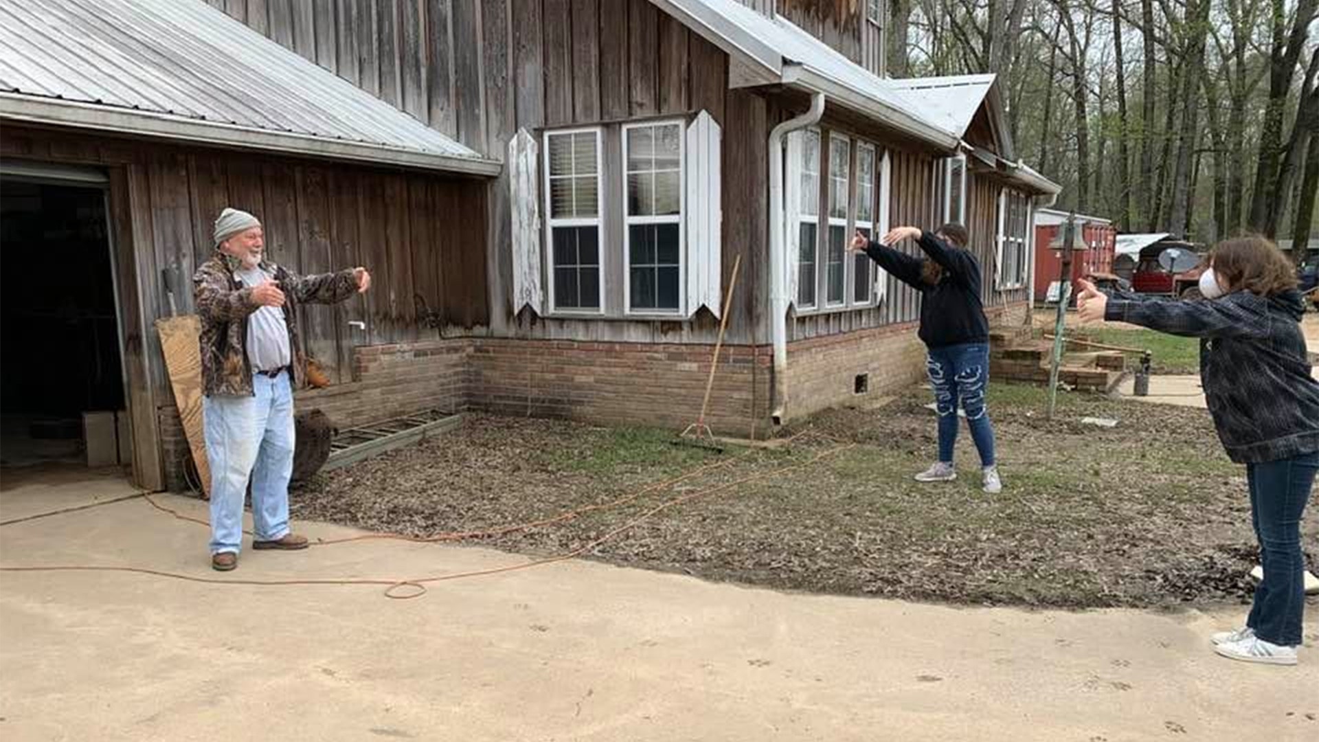My sister and I are both nurses. I am currently under quarantine and my sister and her kids picked up groceries for my dad to keep home from getting out and being exposed. This is her kids and him giving airhugs. 😢
