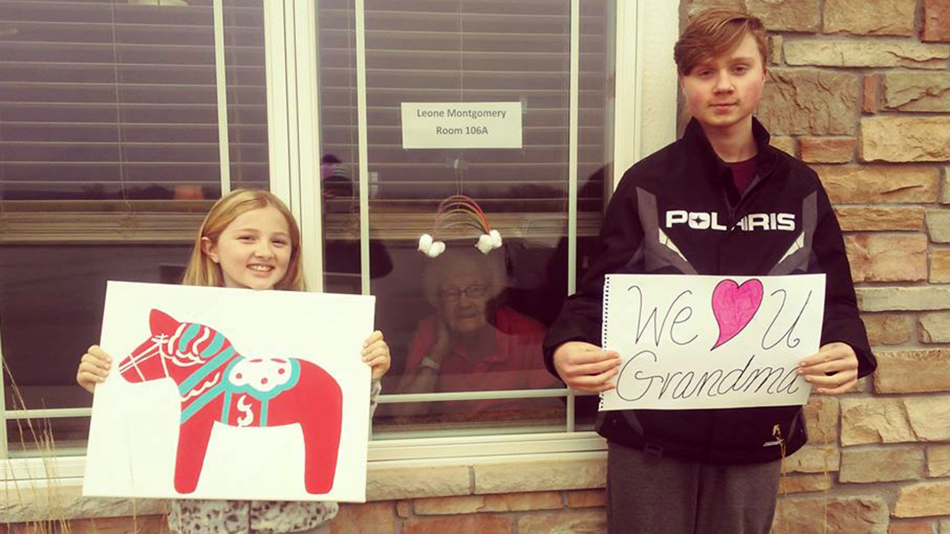 Hi there! My name is Peggy Frederickson. My mother is Leone Montgomery, who is 98 years young. She lives in Osceola, Wisconsin in an assisted living home. Her great grandchildren, Evan and Ali Cable of Forest Lake, MN surprised her with a hand-painted photo of a Swedish horse "The Dalahast" as she is 100% Swedish herself, and an "I love you" sign. Sheer joy on her face as she was able to see the kids, during this Coronavirus pandemic. She's been on lock-down for several weeks. It was so nice for her to see them in person, and talk via cell phone. Bringing a little joy in such times, makes for big smiles and one happy grandma. They look forward to the day they can throw their arms around her in a real hug!