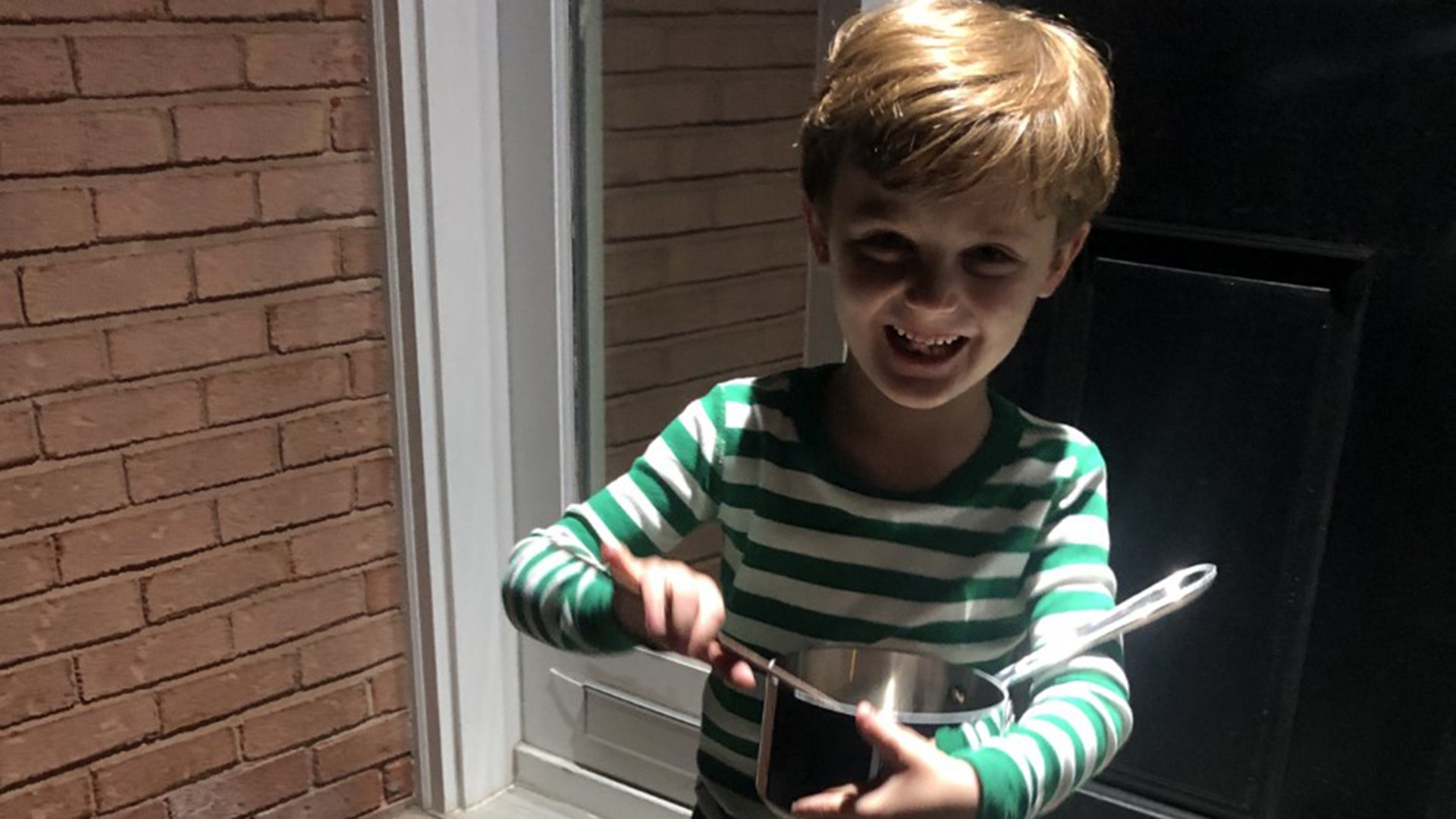 Each night at 8pm our community ‘gathers’ on our front steps to make some noise as a reminder that although we may not see each other, we are all in this together. Last week the Clayton, Missouri fire &amp; police trucks joined us. Each night they choose a different street to ride down - sirens on and lights flashing. Every night when we hear the noise I am reminded how thankful I am to be surrounded by so much love and support. Here’s a pic of my 5 year old son, Jack - up past his bedtime to make some noise. Nicole Loiterstein Clayton, Missouri