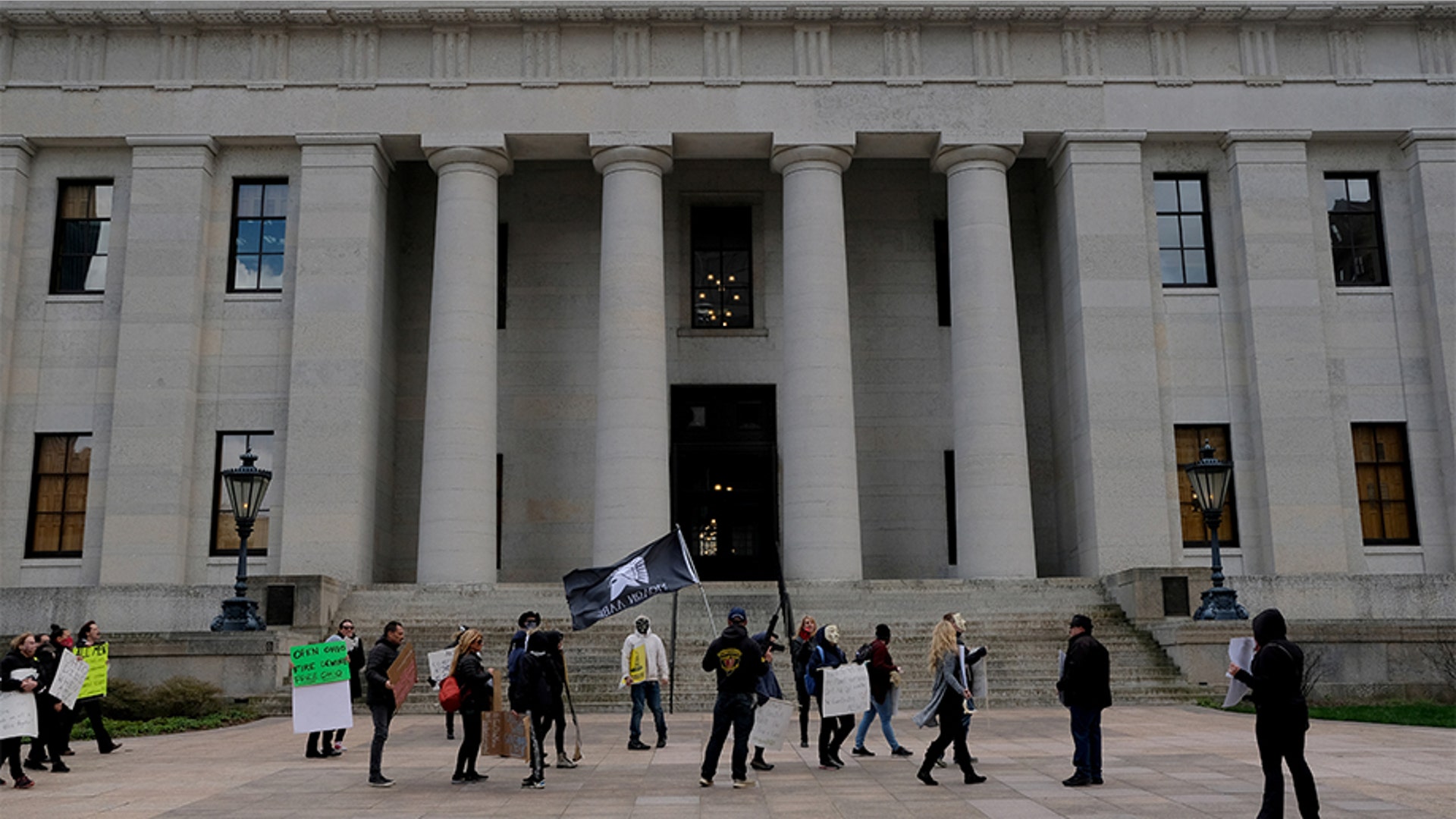 Protesters carried signs and changed.