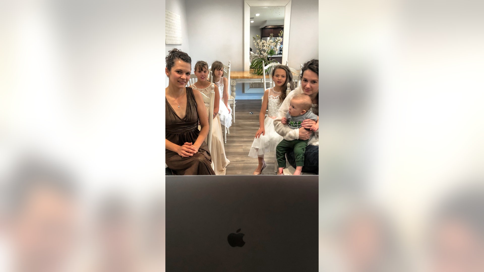 The virus has stopped us from traveling to my sister's wedding😢 We made the best of it and dressed up the Maid of Honor and flower girls, made a ceremony area in our dinning room, and watched the FB Live!