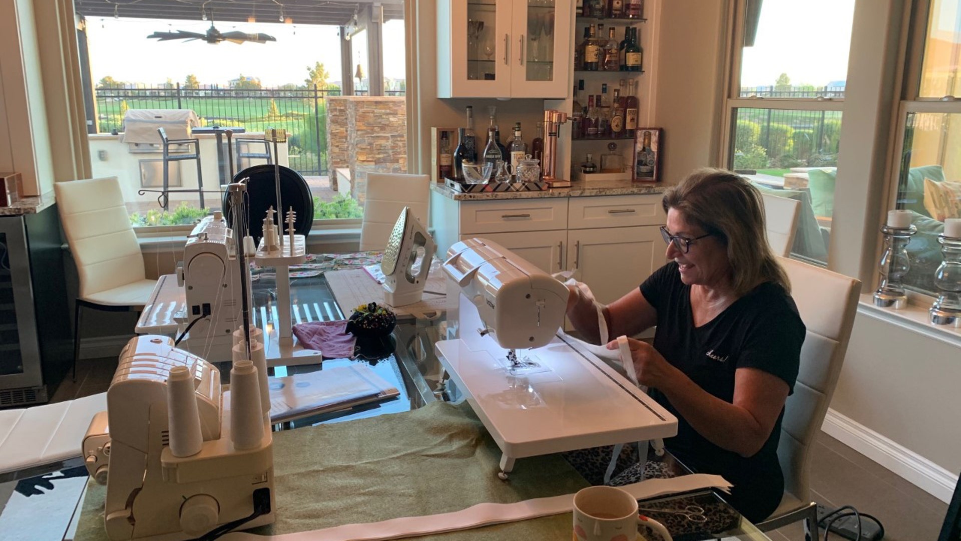 Greetings- Here is a pic of my wife Theresa sewing away in our dining room! She has sewn and donated hundreds of masks to our local community hospital, our Family Practice office and friends/family! My wife is a great person and a great American! Mark Backes