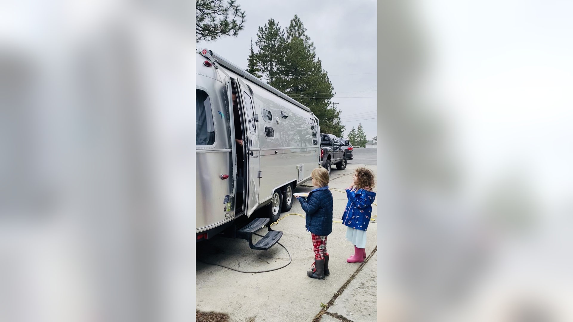 I am a cancer survivor and my husband is a doctor in Spokane Washington. He now lives in our airstream in the driveway. This is a photo from our girls taking him pancakes after a call shift. It’s the only way they see their daddy in person these days. We miss him!