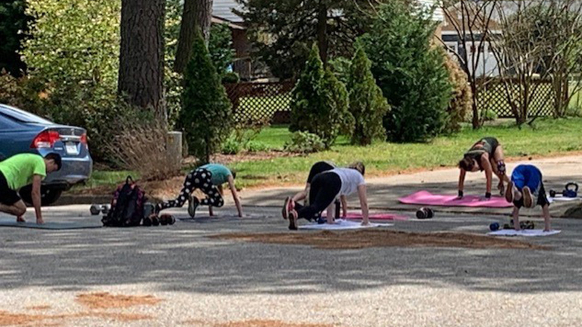Hey, I want to submit photos of our neighbor teaching the neighborhood kids CrossFit to stay in shape during quarantine. My kids love it and look forward to it. She even gave them writing assignments! Her kids are grown and this is her way of helping out! Take care, Leila Kawecki
