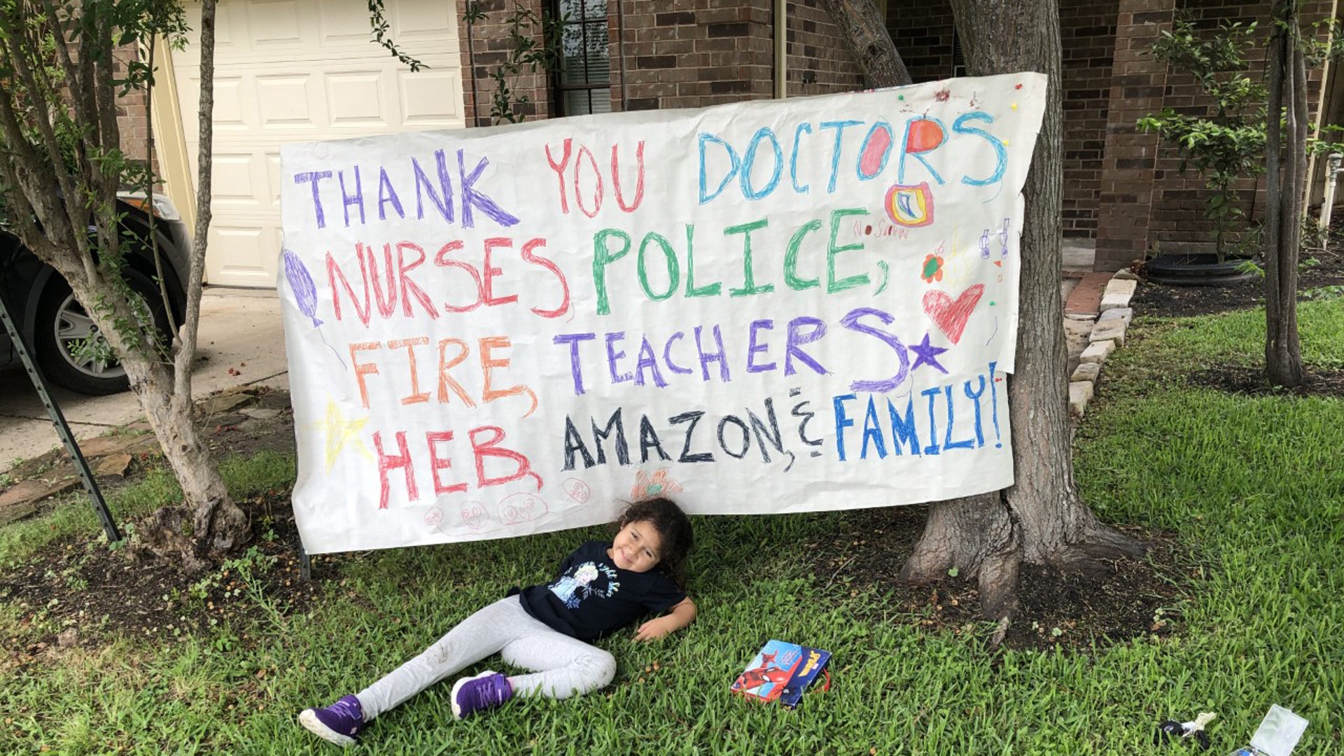 I can one day tell you my bizarre and unique coronavirus story but for now have to focus on my recovery. I want to do my part to spread the positivity in America though and to reduce the anxiety and fear so please see my attached pictures and feel free to put them on your website. I want people to know how grateful I am to the people who helped me continue to get through this but also let everyone know we can recover and move forward. The story behind this picture is a little bit funny because since we are still not allowed to go out to very many places I had to work with what we had around the house so I used the back of leftover an unused Christmas wrapping—Elsa and Paw Patrol-/to make these banners. All of the people mentioned in this manner contributed to saving my life.