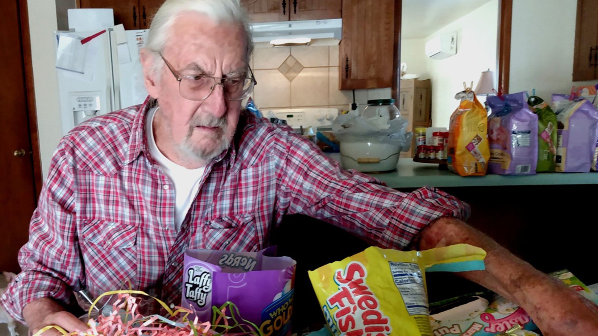 Richard "Cas" Casanova, 85, of Las Cruces, NM, lived in spartan married student housing at New Mexico State University 60 years ago. Then a young father of two, he lived in "Sutherland Village," a part of the campus filled with tiny cinderblock homes that are still in use to this day. But now, the COVID-19 pandemic has stranded international students and young families in the married student housing and in dorms on the NMSU campus. Cas decided to make 25 "Easter Bags," each with a tiny chocolate bunny as well as other treats, for the students stranded on campus, which is closed except to those with no other place to go. He is donating the treats to Aggie Cupboard, a food bank just yards from his old campus home, that serves students and staff in need. The octogenarian, a retired teacher, says that as an alumnus, he wants to help today's students. He remembers neighbors helping neighbors during his time as a student, and a few years later during the Hong Kong Flu. Pictures taken by Holly Kurtz.