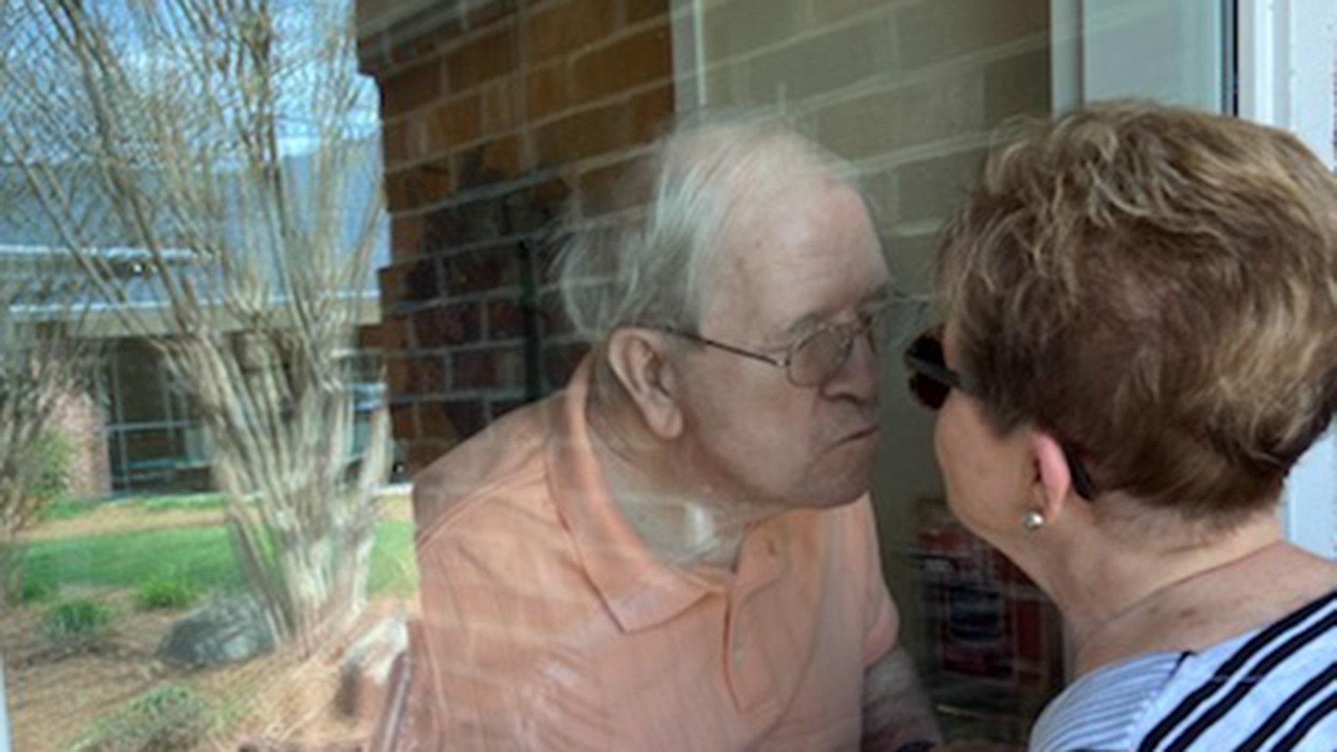 My mom Judy Wood visiting my Dad Howard Wood at a memory care unit in Clemmons NC..they’ve since disallowed these types of visits too