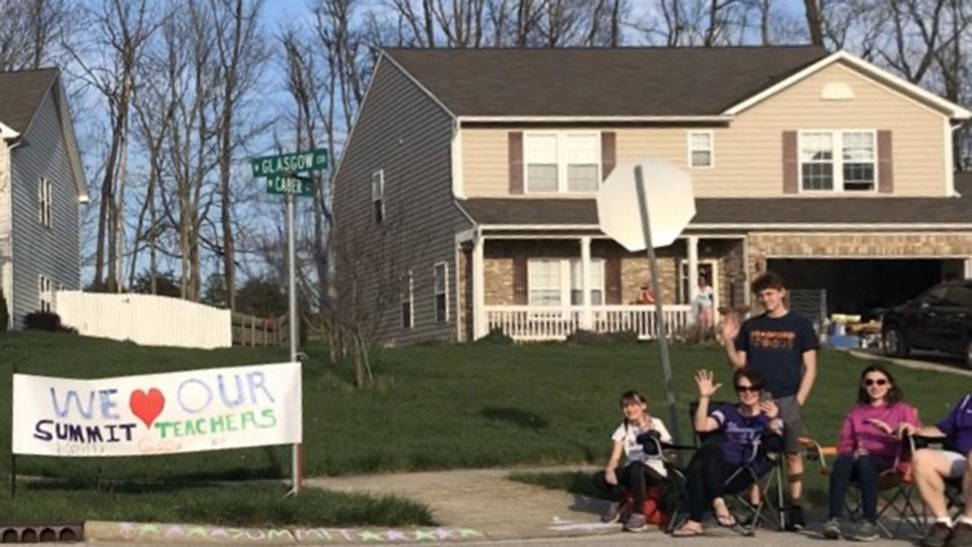 Summit Elementary School students respond to their teachers parading the community to say hello. Bloomington, Indiana