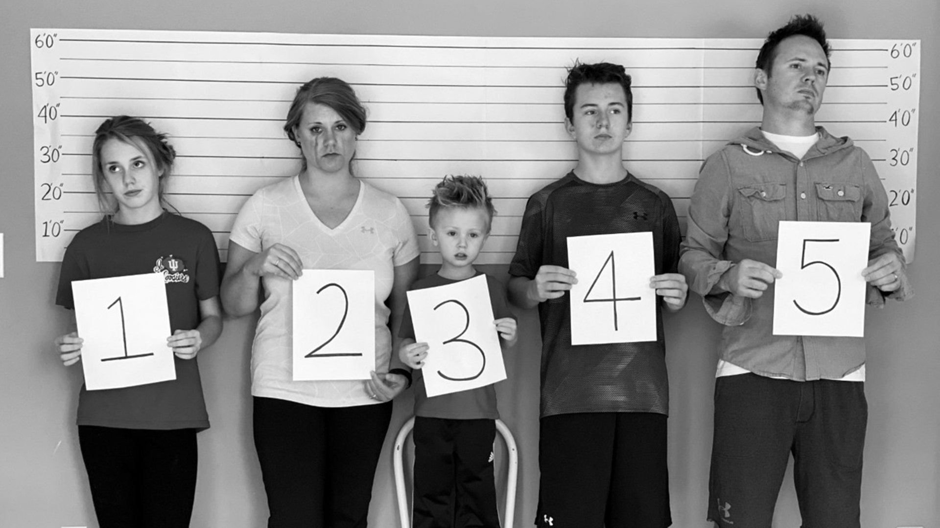 Trying to find fun family activities to pass the time so we have started....FAMILY THEME WEEK. Ben &amp; Summer Marks along with children Benjamin 15yr, Anna 14yr, &amp; Tolliver 3yr. I will be sending each day in a separate email. March 26, 2020 our theme was COVID STATE PENITENTIARY. Mugshots have now been released to the public...Charges listed below. #4712 THE LINEUP #4721 CHARGE: Sneaking gummy fruit snacks #4724 CHARGE: Not putting dirty laundry in the hamper #4727 CHARGE Playing Fortnite to all hours of the night #4730 CHARGE Making an excessive amount of Tik Toks #4732 CHARGE Micro managing the pantry