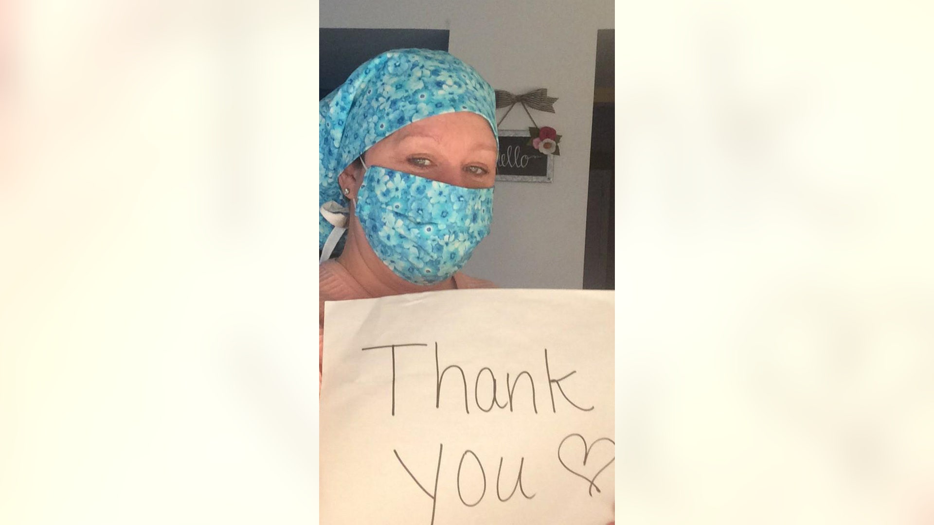 My sister, Christine Janos is an emergency room nurse at Baltimore Washington Medical Center in Glen Burnie Maryland. A member of her church made this mask and cap set for her. The picture is a heartfelt thank you