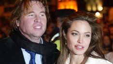 Val Kilmer says he ‘couldn’t wait’ to kiss co-star Angelina Jolie and ‘buy her a jet’