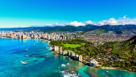 Hawaii sets reopening date for bars, theaters, but not tourism