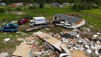 Southern states struggle to recover from destructive tornadoes; more than 30 dead