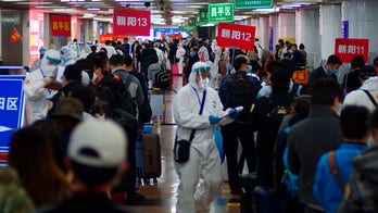 Chinese epicenter Wuhan raises number of virus dead by about 50 percent