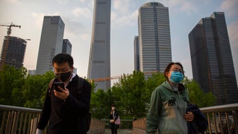 Chinese city ramps up coronavirus restrictions in country's biggest known outbreak since pandemic began