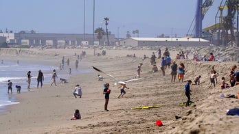 Thousands hit Southern California beaches to cool off amid coronavirus stay-at-home order