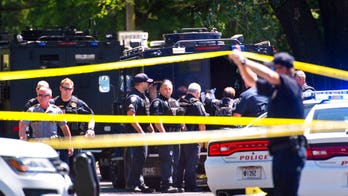 Baton Rouge police shooting suspect stood over dead officer and kept firing, investigators say