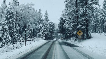 More snowfall in the West, Hurricane Epsilon stirs up conditions in the East