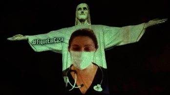 Christ the Redeemer pays tribute to coronavirus doctors, nurses