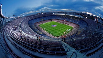 Barcelona sells Camp Nou title to raise money to fight virus
