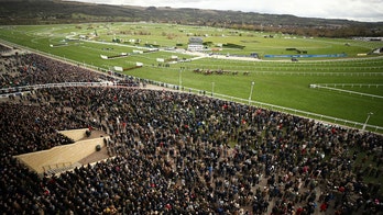 Cheltenham defends decision to proceed with horse race event