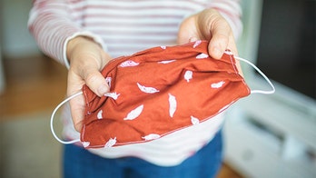 Dad uses coronavirus mask to tie umbilical cord after wife gives birth outside hospital: report