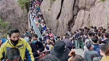 Popular tourist attraction in China mobbed by visitors after coronavirus restrictions ease