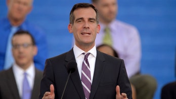 LA Mayor Garcetti takes knee at George Floyd protest, faces backlash for calling National Guard