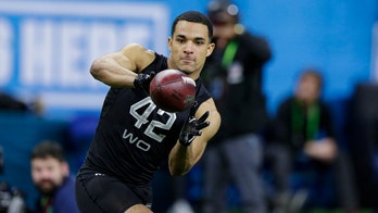 Record-setting Navy QB Perry will get NFL shot with Dolphins