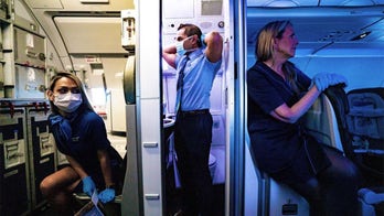 Flight attendant shares eerie photos of life on planes during the coronavirus outbreak