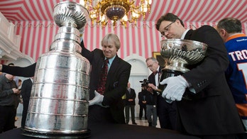 With hockey on hiatus, storied Stanley Cup is locked away