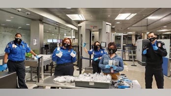 TSA officers make masks out of socks for local homeless shelters during coronavirus outbreak