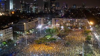 Israeli protesters accuse Netanyahu of using coronavirus to erode democracy, escape corruption charges