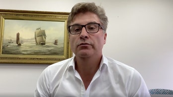 Australian beer-drinking mayor fined for flouting coronavirus social distancing measures