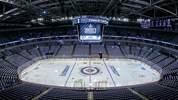 Winnipeg Jets' fan completes 'ministick rink' resembling arena in basement while under quarantine