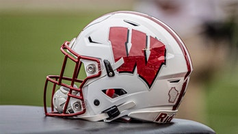 Ex-Wisconsin wide receiver arrested, charged with murder: report