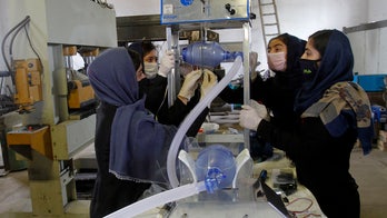 Afghan girls building ventilators with car part for coronavirus response