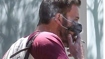 Ben Affleck spotted with his protective mask off to smoke a cigarette in public