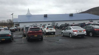 Three churches challenge NY county’s ban on drive-in services