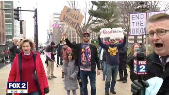 Michigan city commissioner who joined lockdown protest called to resign for violating social distancing