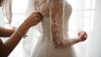 Woman tries on wedding dress 35 years later, husband has emotional reaction: 'Really made my day'