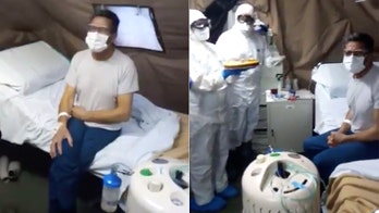 Medics surprise coronavirus patient in Italy with birthday cake, song at army field hospital